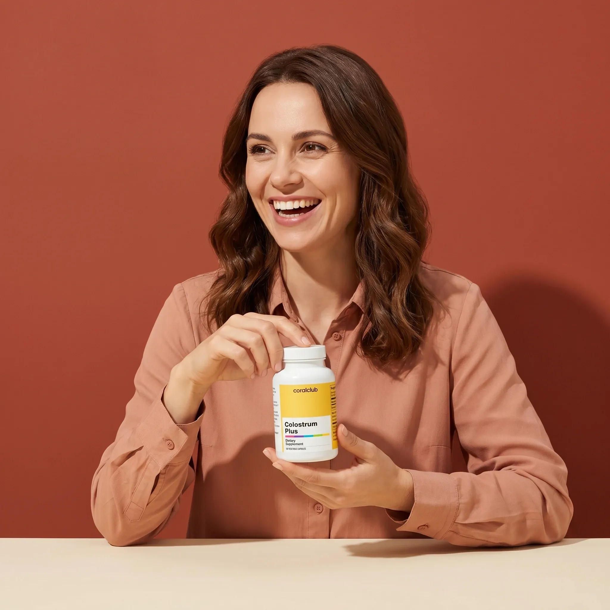 Moteris laiko Colostrum Plus pakuotę